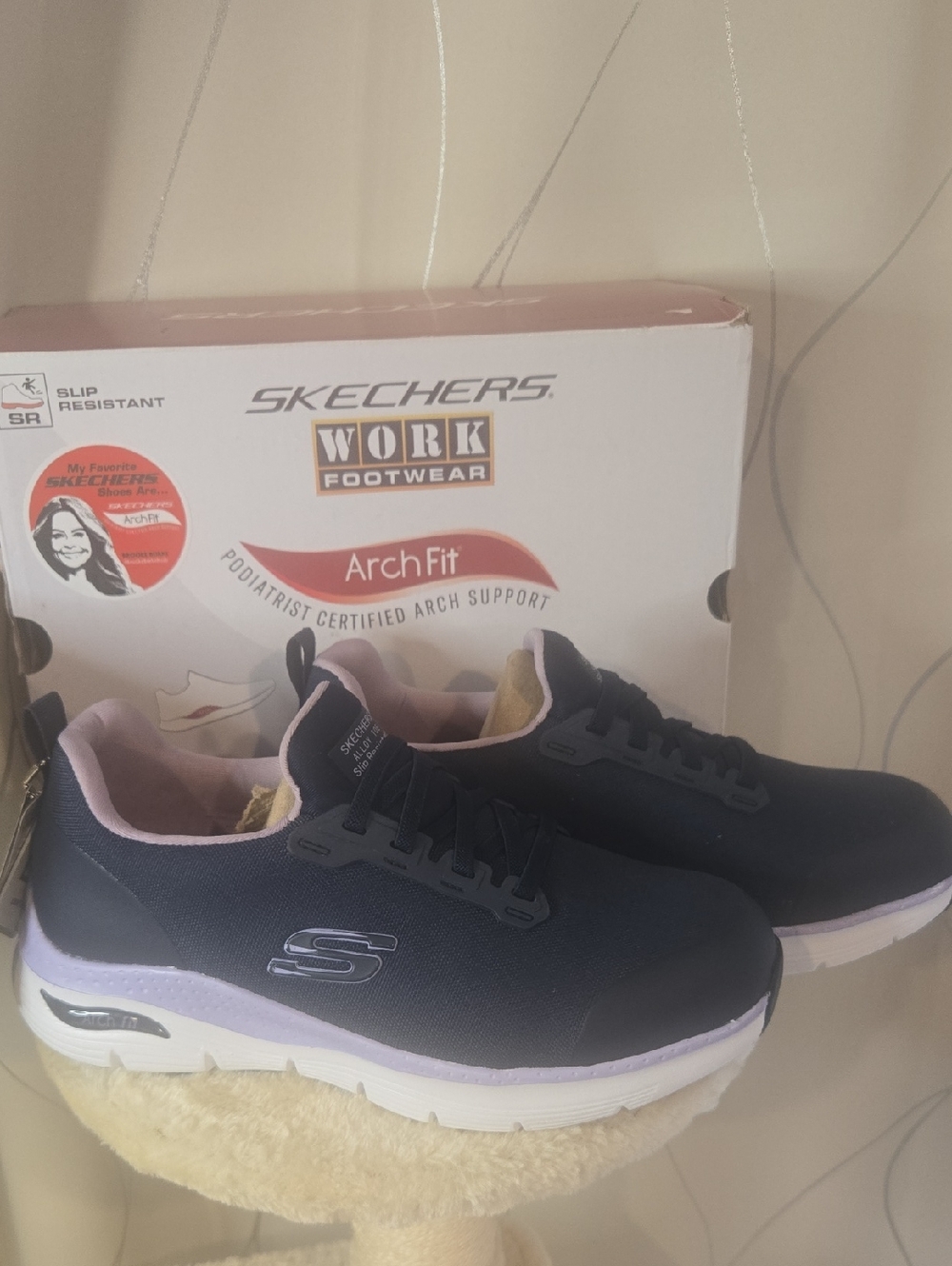 Skechers Arch Fit Women's Navy and Light Pink Slip-On Sneakers